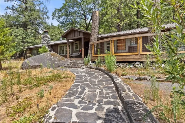 a view of a chairs and table in a outdoor room