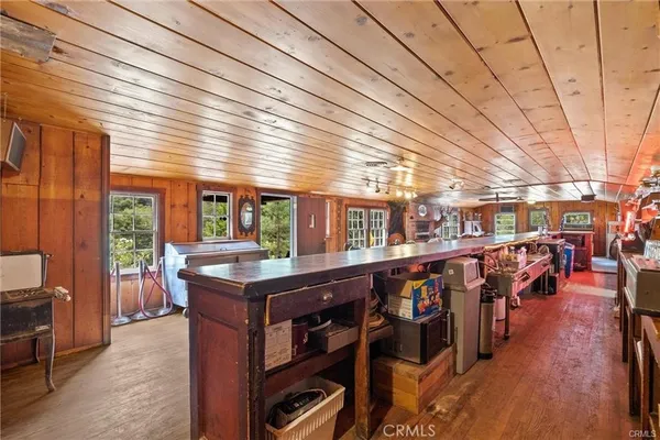 a kitchen that has a sink and a stove