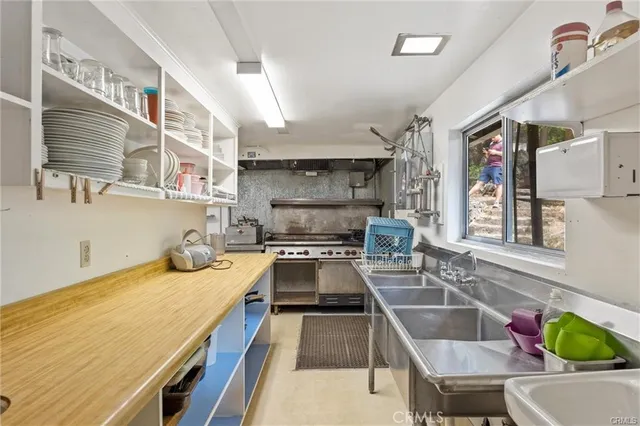 a view of a large building with a mountain in the background