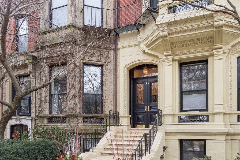 64 Commonwealth Avenue, Unit 5 Boston, MA 02116 - Photo 24 of 24 a front view of a building with large windows
