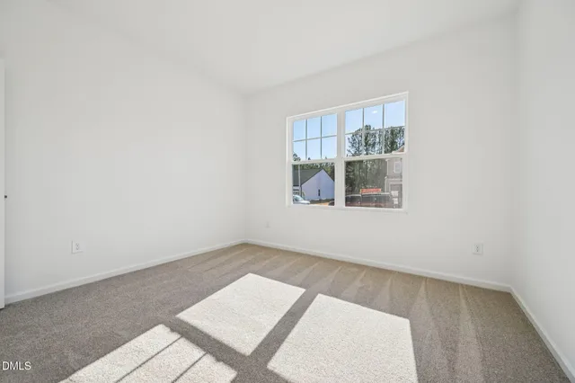a bathroom with a sink toilet vanity and shower