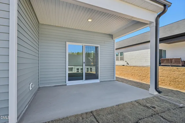 a house view with a backyard space