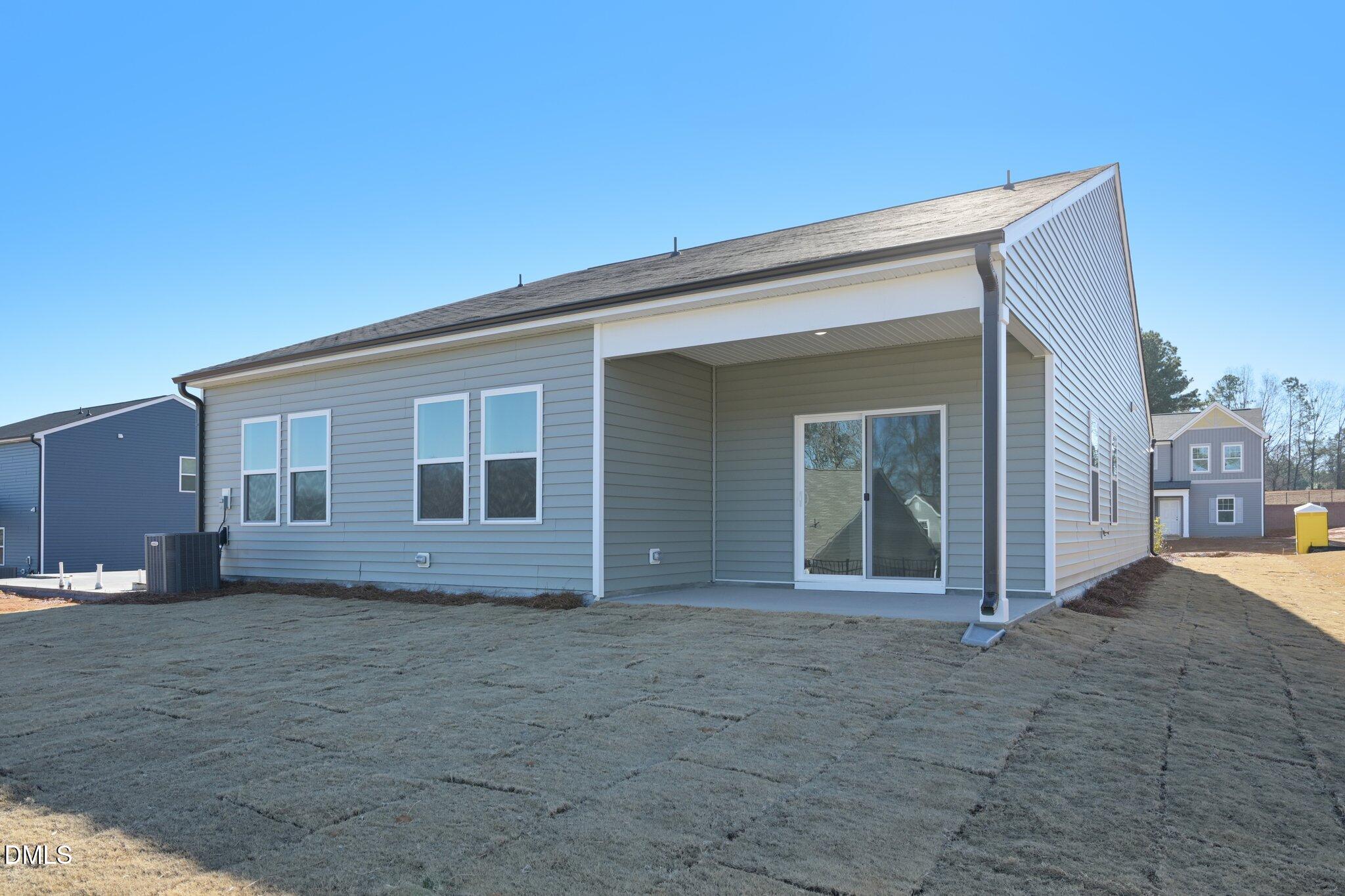 11766 Salers Loop Middlesex, NC 27557 - Photo 37 of 55 a view of house with backyard and trees