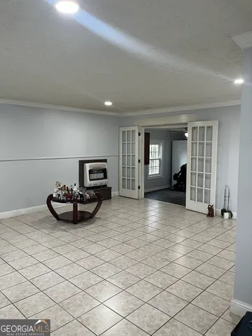 a view of a livingroom with furniture and window