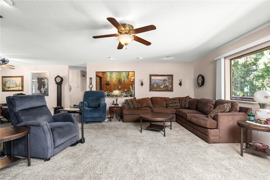 14219 Wycliff Way Magalia, CA 95954 - Photo 10 of 67 a living room with furniture and a large window
