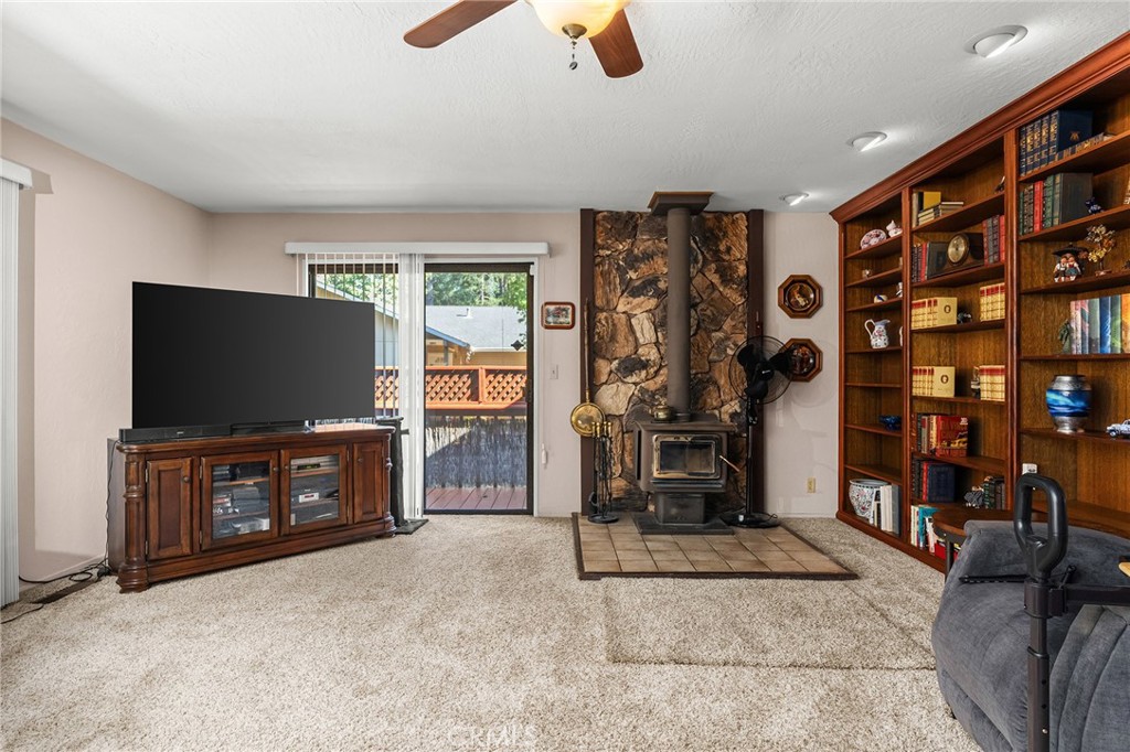 14219 Wycliff Way Magalia, CA 95954 - Photo 13 of 67 a living room with furniture and a flat screen tv