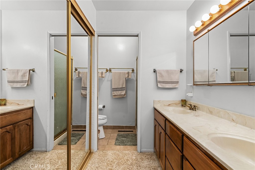 14219 Wycliff Way Magalia, CA 95954 - Photo 28 of 67 a bathroom with a sink and a mirror