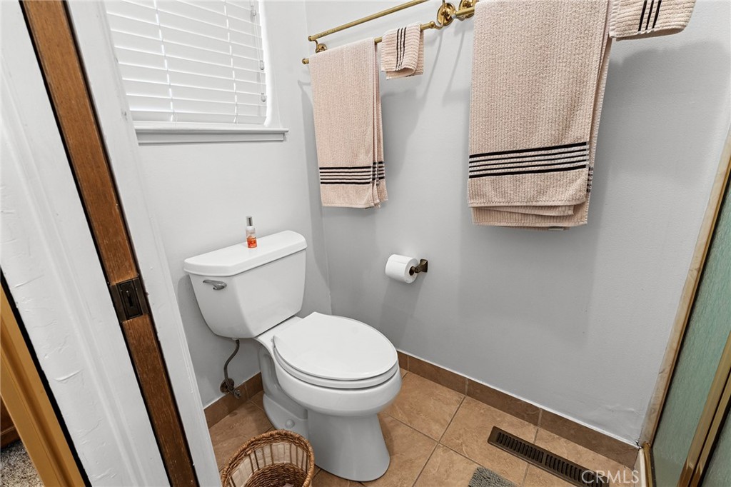 14219 Wycliff Way Magalia, CA 95954 - Photo 30 of 67 a white toilet sitting next to a sink
