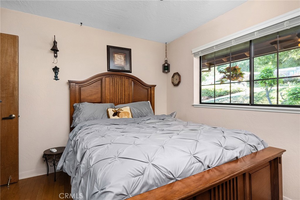 14219 Wycliff Way Magalia, CA 95954 - Photo 32 of 67 a bedroom with a bed and a window