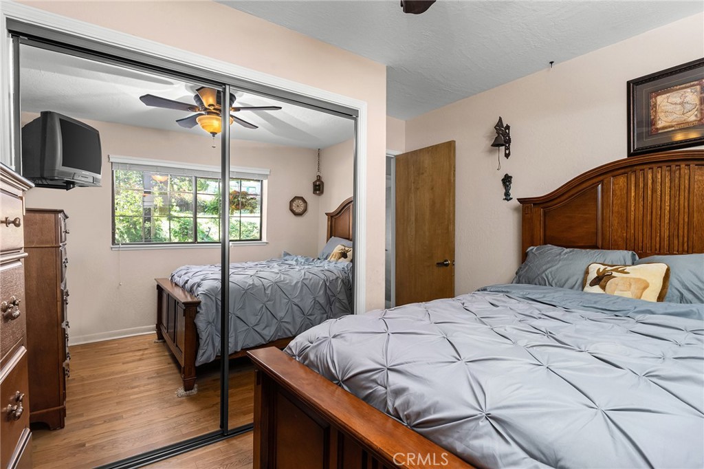 14219 Wycliff Way Magalia, CA 95954 - Photo 33 of 67 a bedroom with a bed and a flat screen tv
