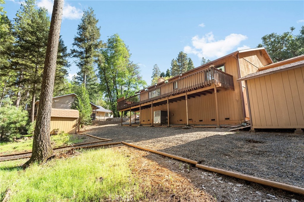 14219 Wycliff Way Magalia, CA 95954 - Photo 42 of 67 a view of a house with backyard and trees
