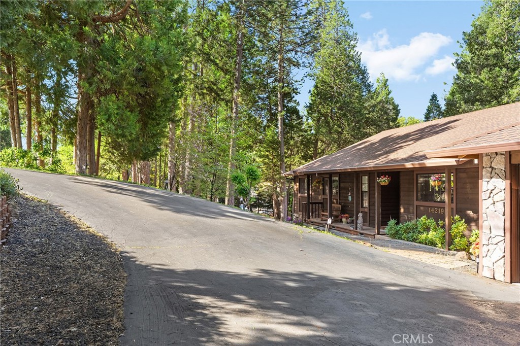 14219 Wycliff Way Magalia, CA 95954 - Photo 46 of 67 a view of a house with a garden