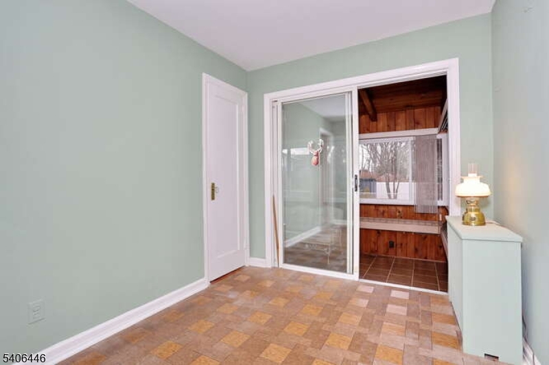 22-06 Arcadia Road Fair Lawn, NJ 07410 - Photo 12 of 33 a view of a room that has a bed in it