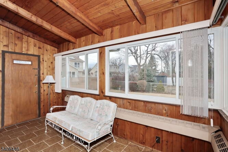 22-06 Arcadia Road Fair Lawn, NJ 07410 - Photo 14 of 33 a living room with furniture and a large window