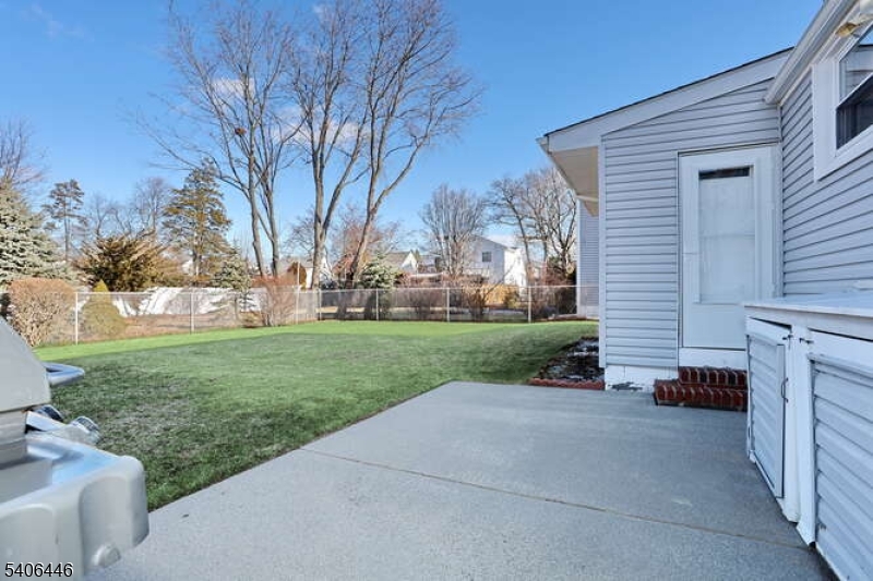 22-06 Arcadia Road Fair Lawn, NJ 07410 - Photo 25 of 33 a view of a house with a yard