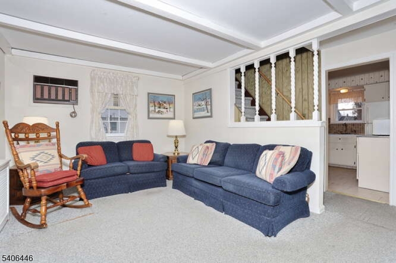 22-06 Arcadia Road Fair Lawn, NJ 07410 - Photo 5 of 33 a living room with furniture and a window