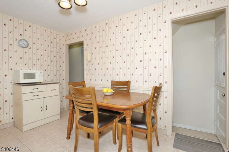 22-06 Arcadia Road Fair Lawn, NJ 07410 - Photo 6 of 33 a view of a dining room with furniture