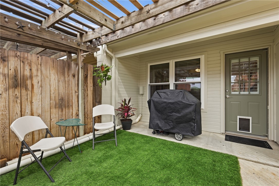 1520 Bennett Street Bryan, TX 77802 - Photo 24 of 24 a view of a porch with furniture and a yard