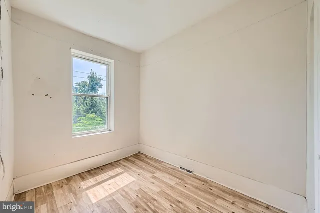 an empty room with a window