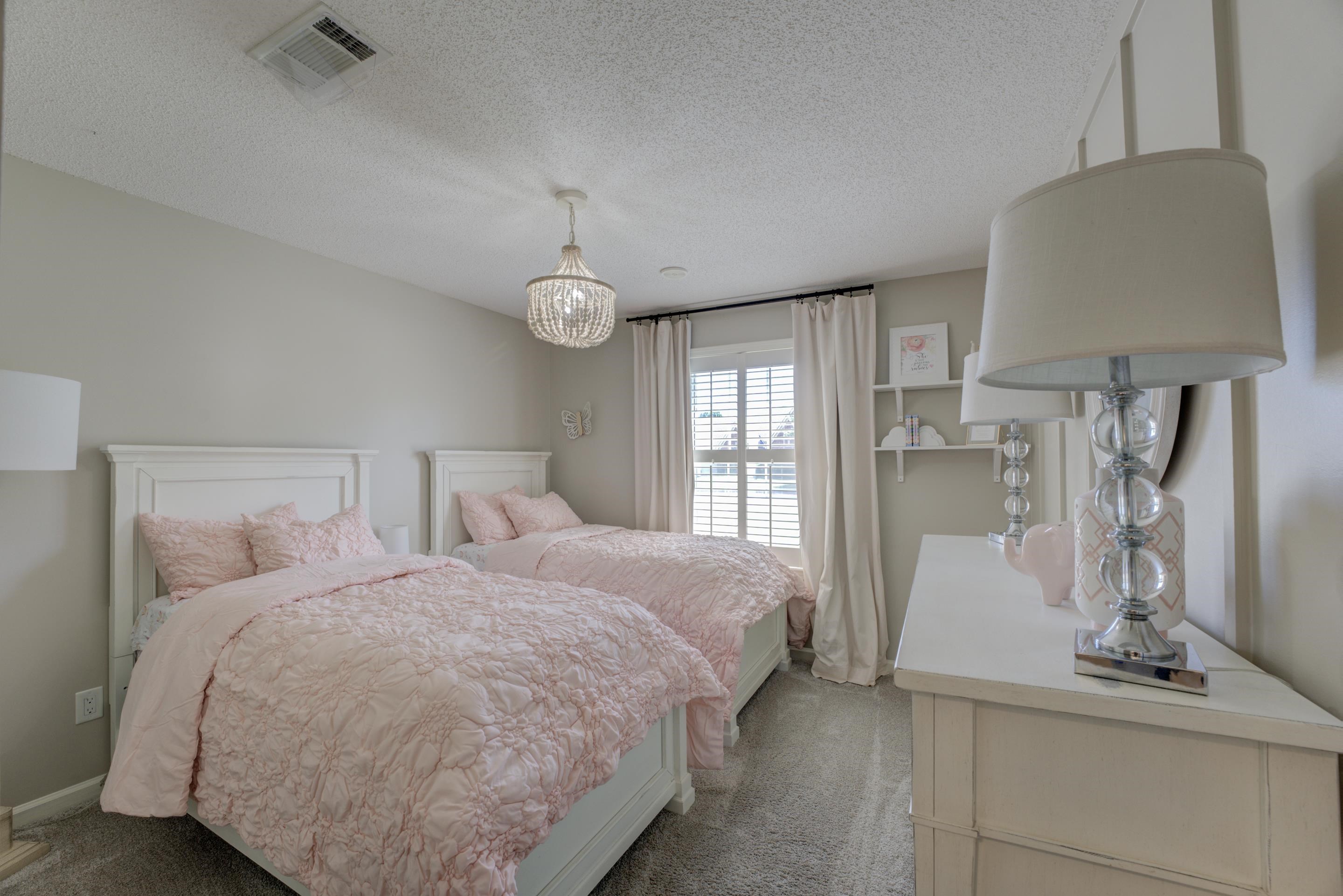 1515 Wolf Pack Drive Collierville, TN 38017 - Photo 17 of 28 a bedroom with double bed and a window