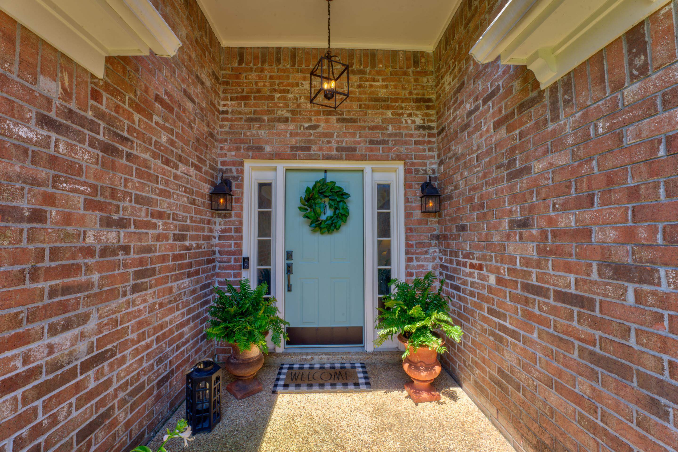 1515 Wolf Pack Drive Collierville, TN 38017 - Photo 3 of 28 a front view of a house with a yard