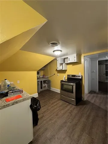 a kitchen with stainless steel appliances stove and refrigerator