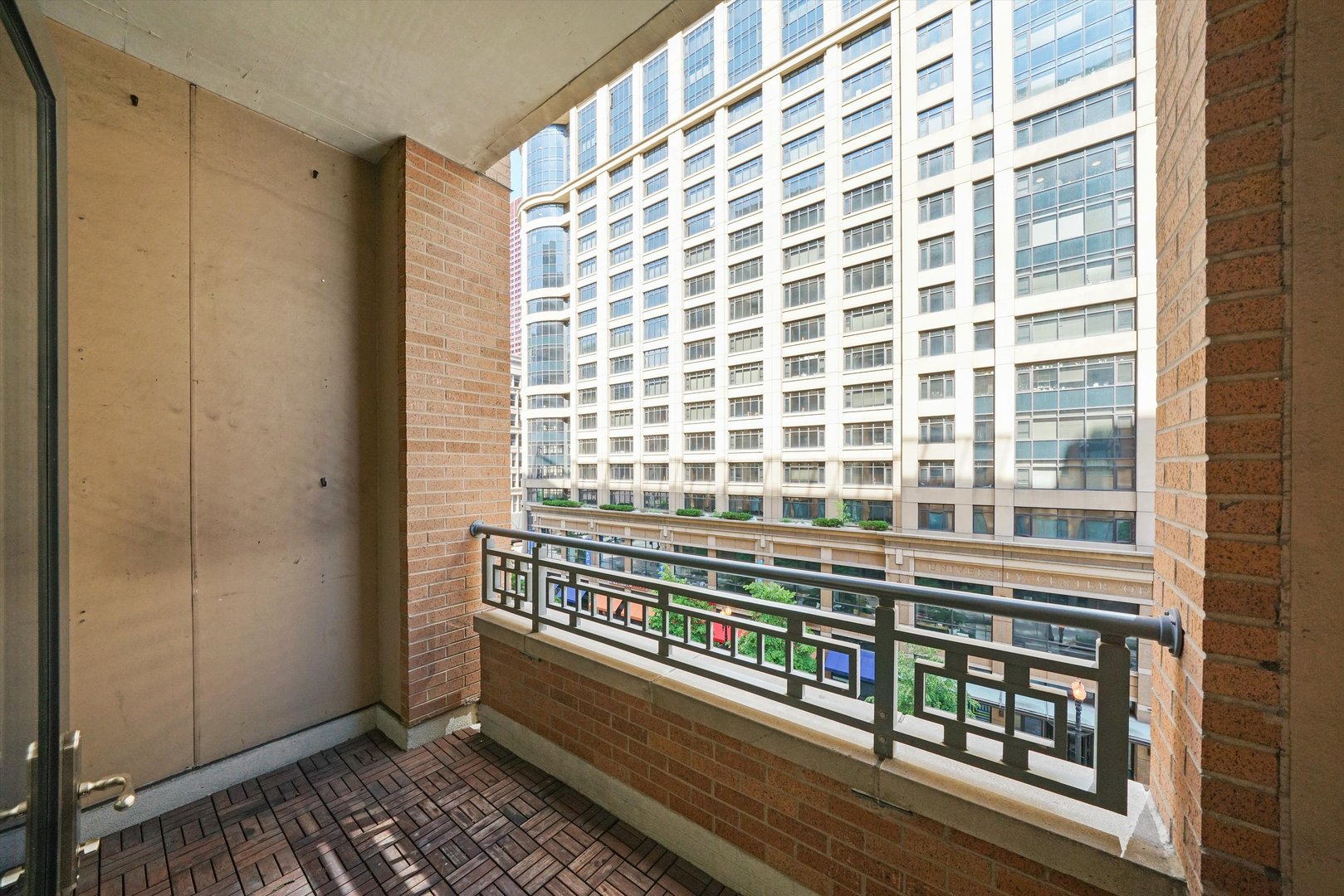 520 South State Street, Unit 503 Chicago, IL 60605 - Photo 12 of 25 a view of a balcony with wooden floor and a sink