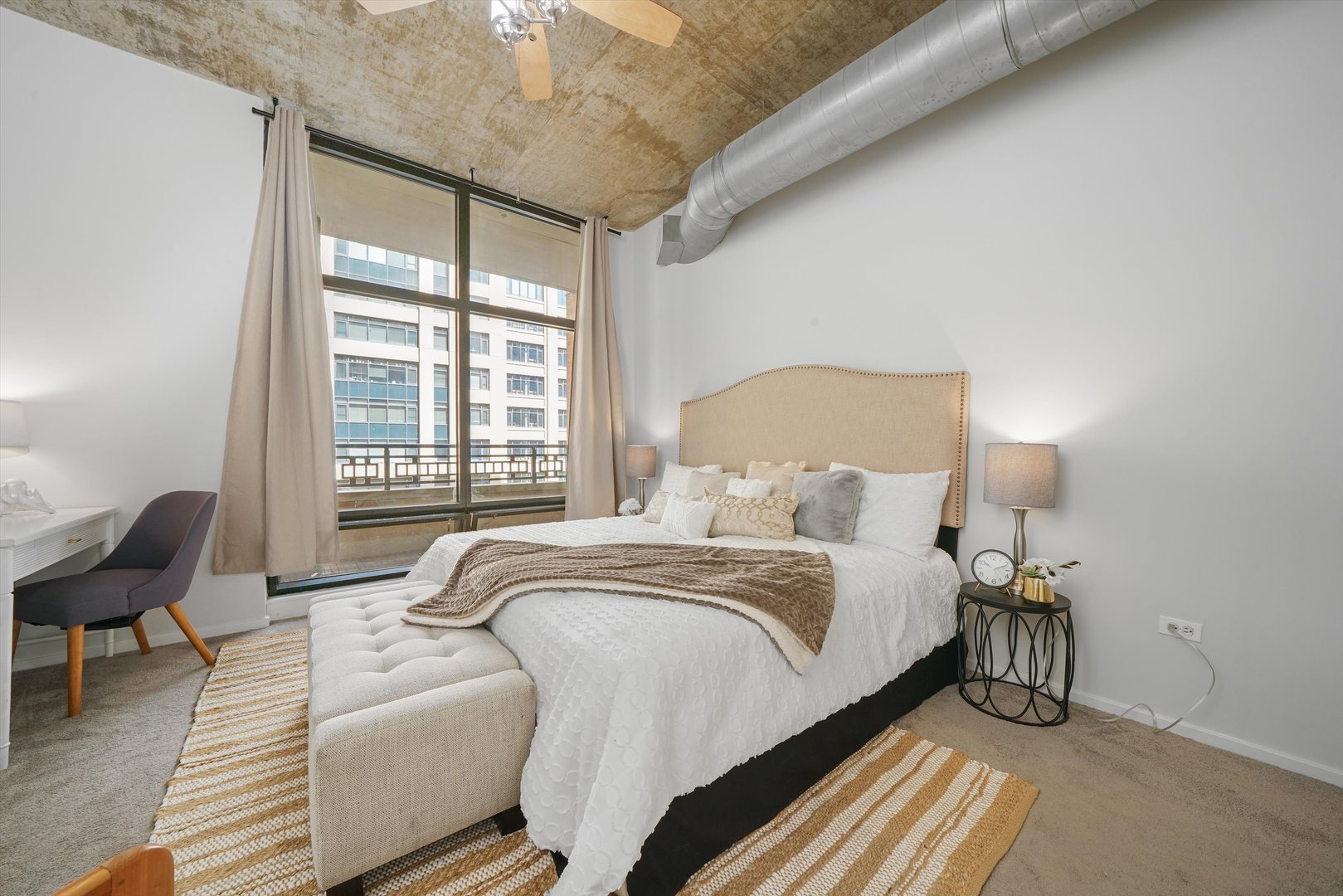 520 South State Street, Unit 503 Chicago, IL 60605 - Photo 15 of 25 a bedroom with a bed and a window