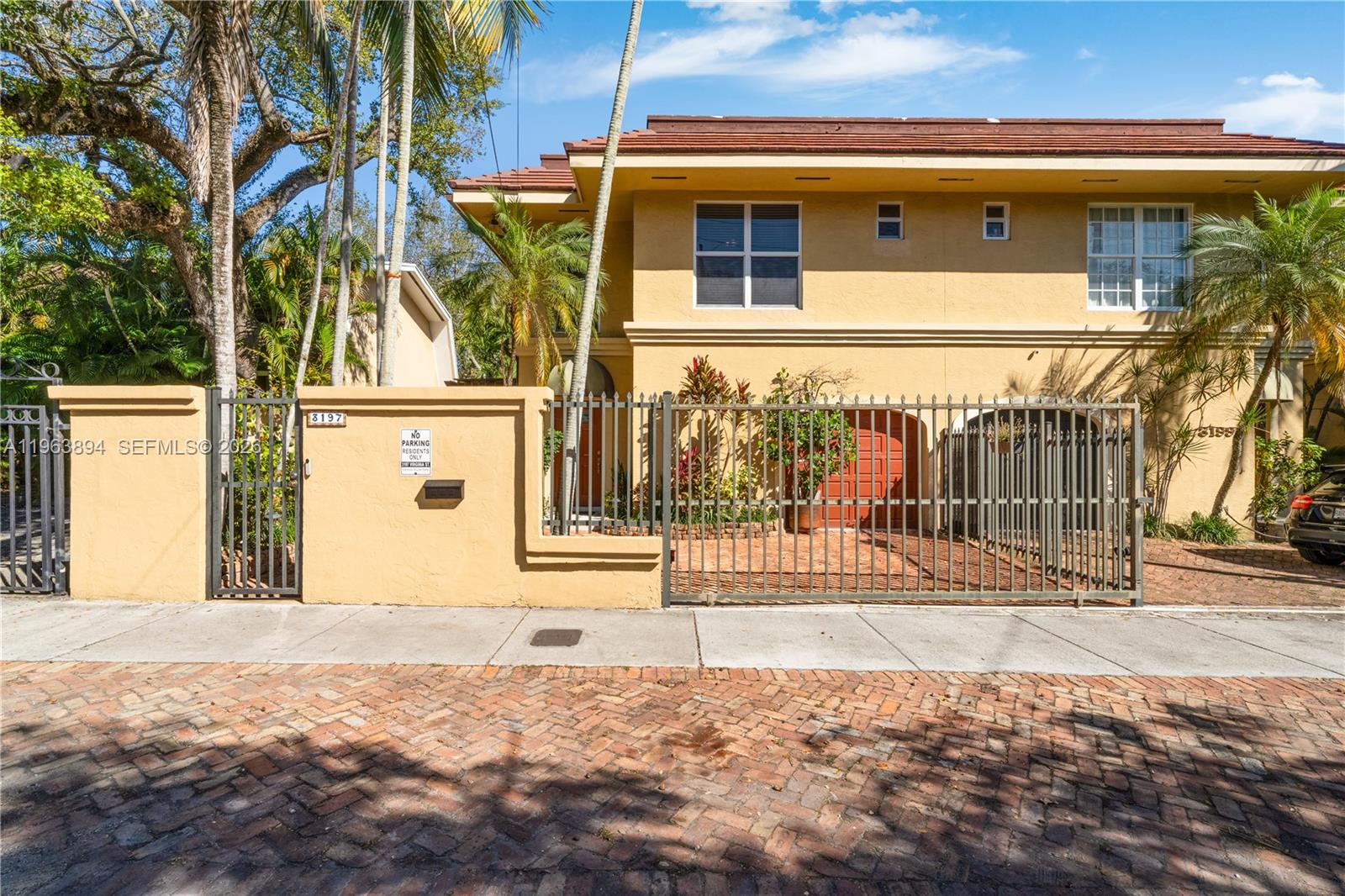 3197 Virginia Street Miami, FL 33133 - Photo 2 of 22 a front view of a house with a yard