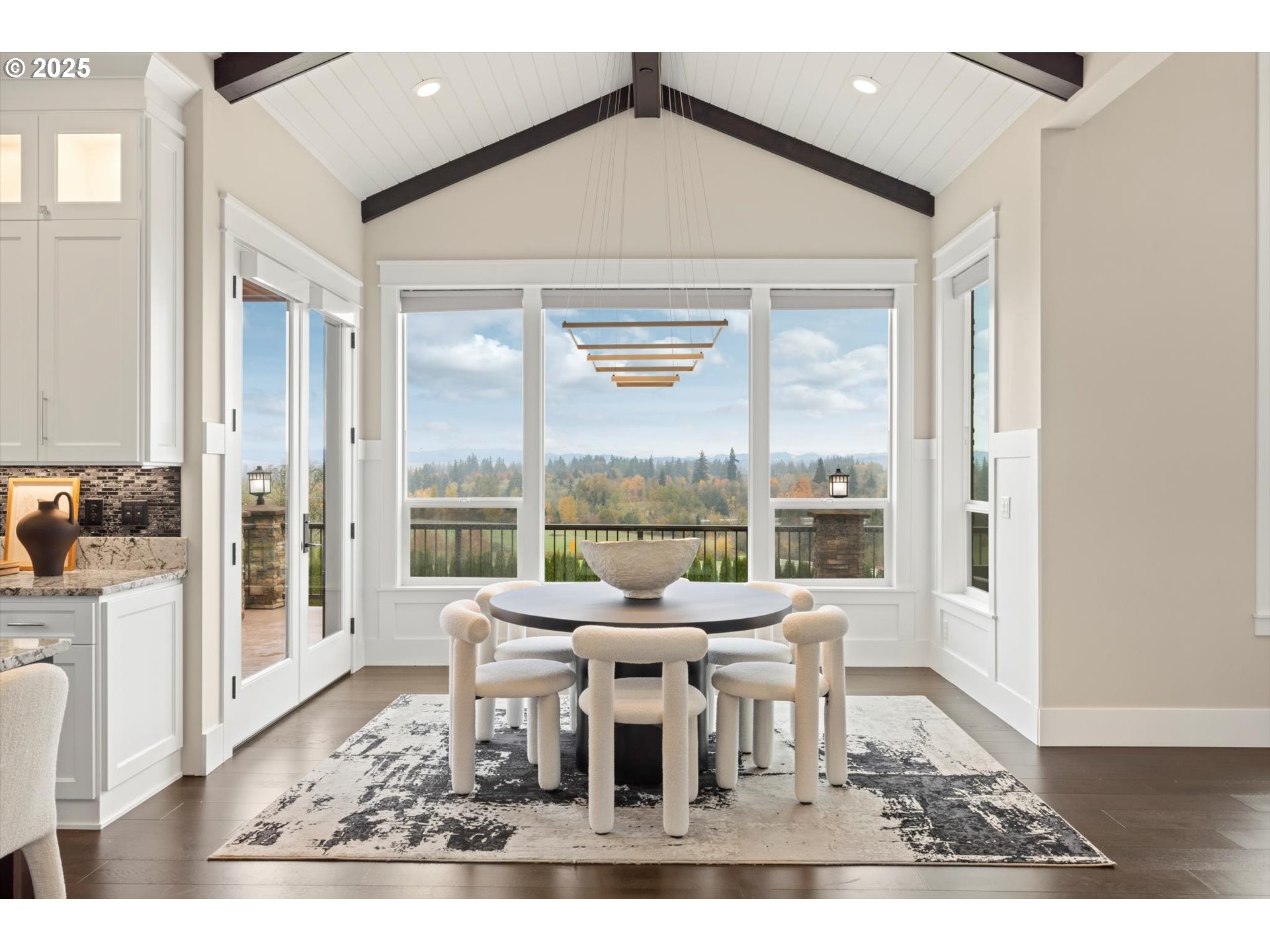 900 Northwest 216th Circle Ridgefield, WA 98642 - Photo 12 of 47 a living room with furniture and a large window