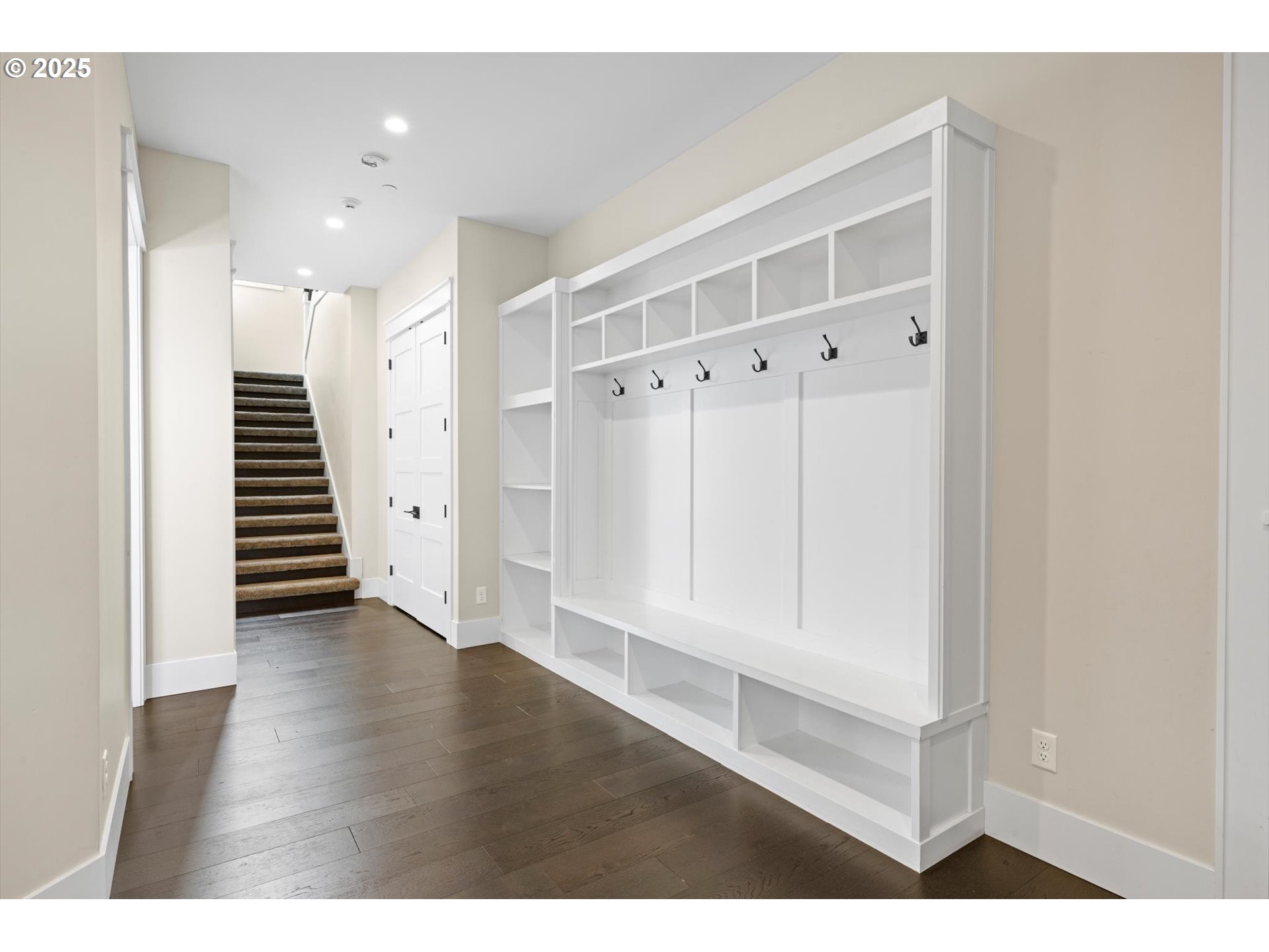 900 Northwest 216th Circle Ridgefield, WA 98642 - Photo 13 of 47 a view of an empty room with wooden floor