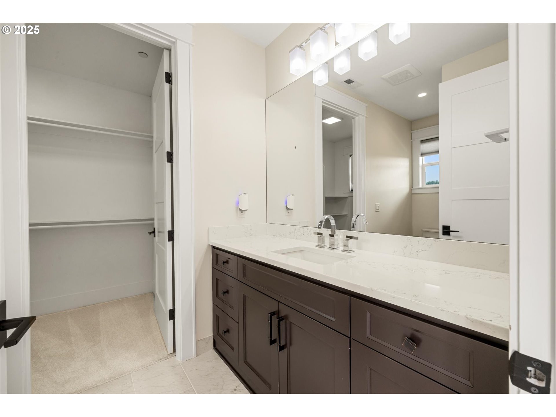 900 Northwest 216th Circle Ridgefield, WA 98642 - Photo 27 of 47 a bathroom with a sink vanity granite and a mirror