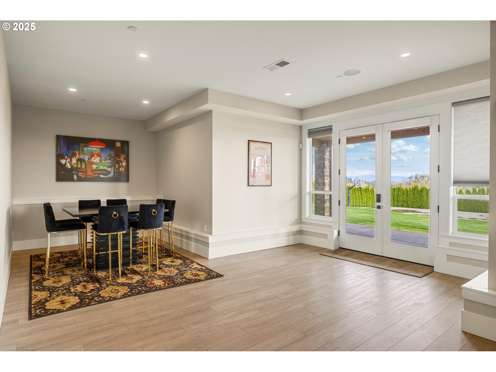 900 Northwest 216th Circle Ridgefield, WA 98642 - Photo 32 of 47 a view of a work space with wooden floor and windows