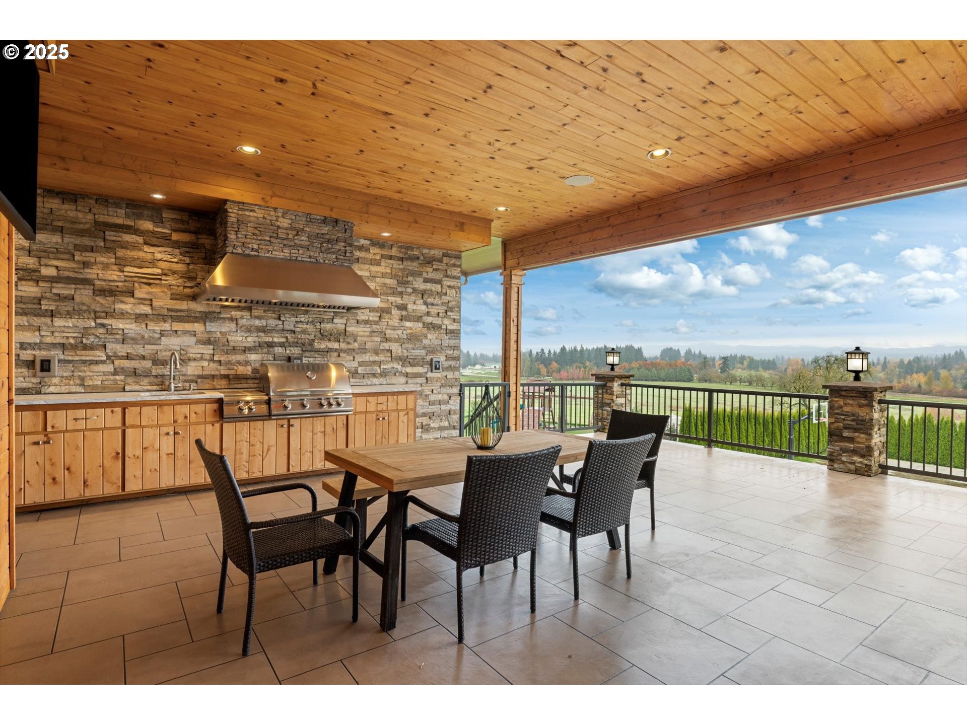 900 Northwest 216th Circle Ridgefield, WA 98642 - Photo 36 of 47 a view of a terrace with furniture and garden