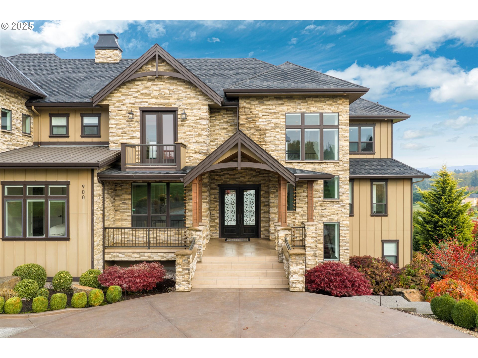 900 Northwest 216th Circle Ridgefield, WA 98642 - Photo 45 of 47 a front view of a house with a garden