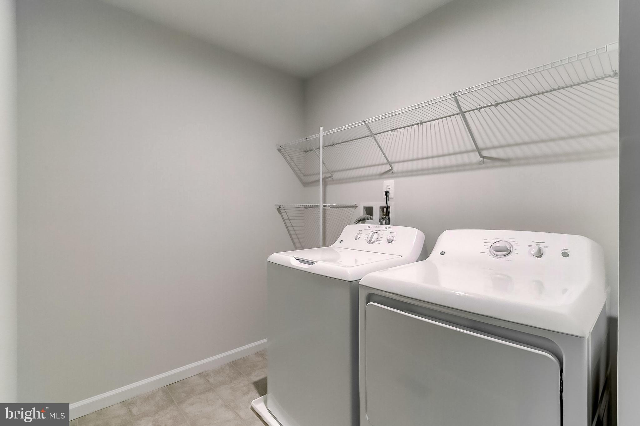1206 Reames Road Baltimore, MD 21220 - Photo 24 of 40 Laundry room on the way to the garage