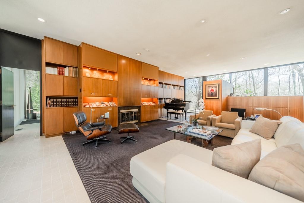 9331 Providence Road Charlotte, NC 28270 - Photo 16 of 39 a living room with furniture gym equipment and a large window