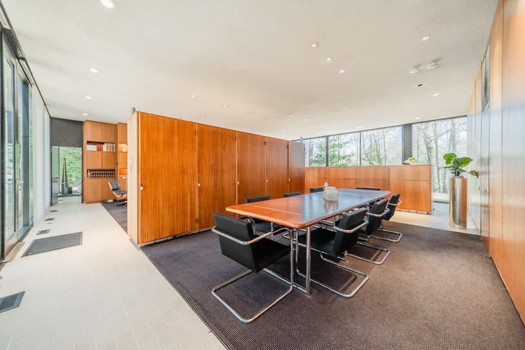 9331 Providence Road Charlotte, NC 28270 - Photo 19 of 39 a dining room with a table and chairs