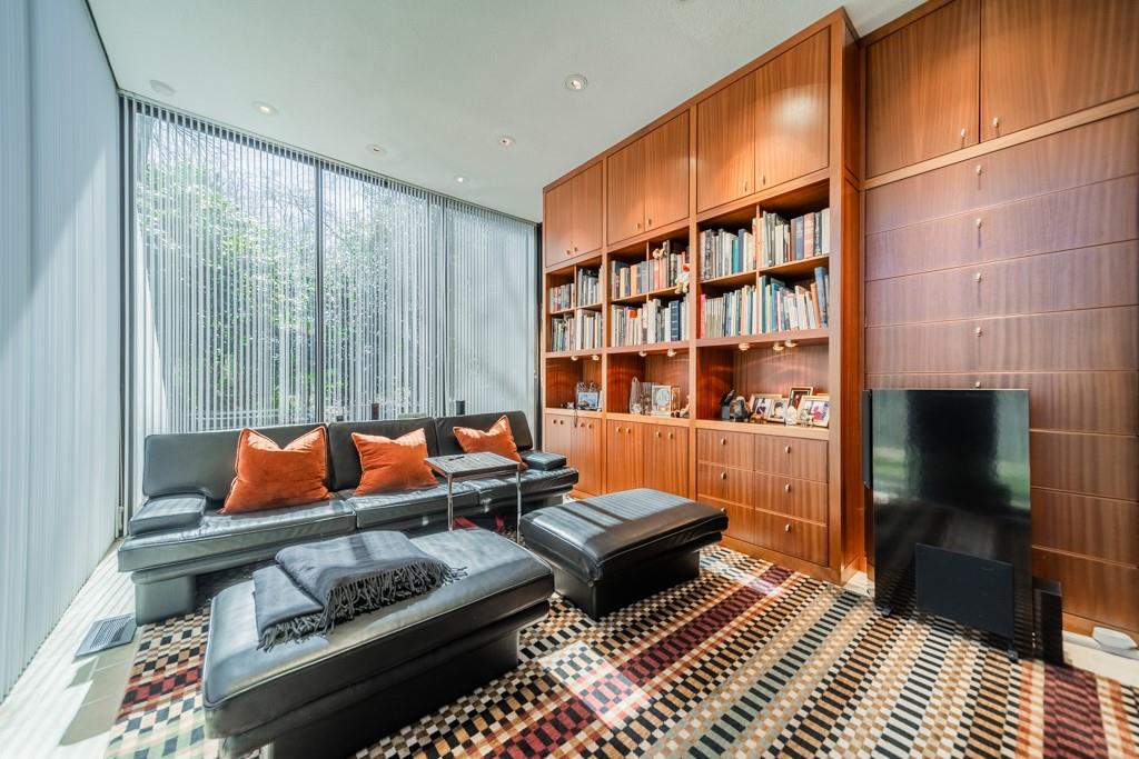 9331 Providence Road Charlotte, NC 28270 - Photo 22 of 39 a blue couch sitting in front of a window