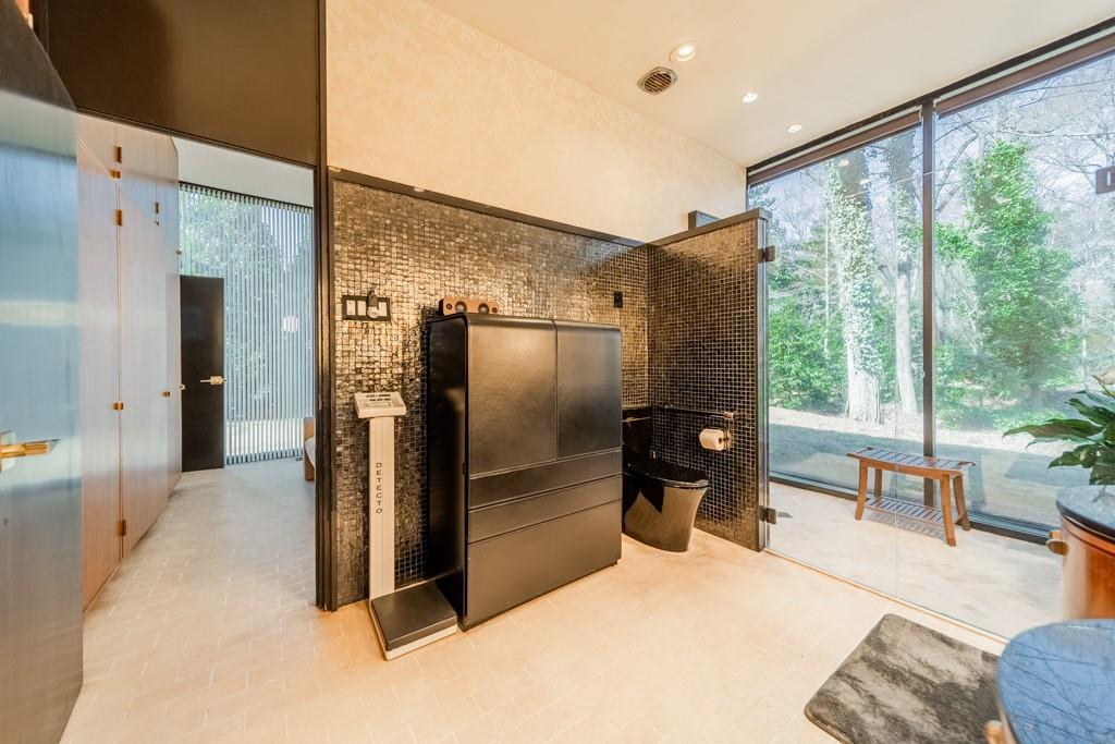 9331 Providence Road Charlotte, NC 28270 - Photo 25 of 39 a kitchen with stainless steel appliances granite countertop a refrigerator and a stove