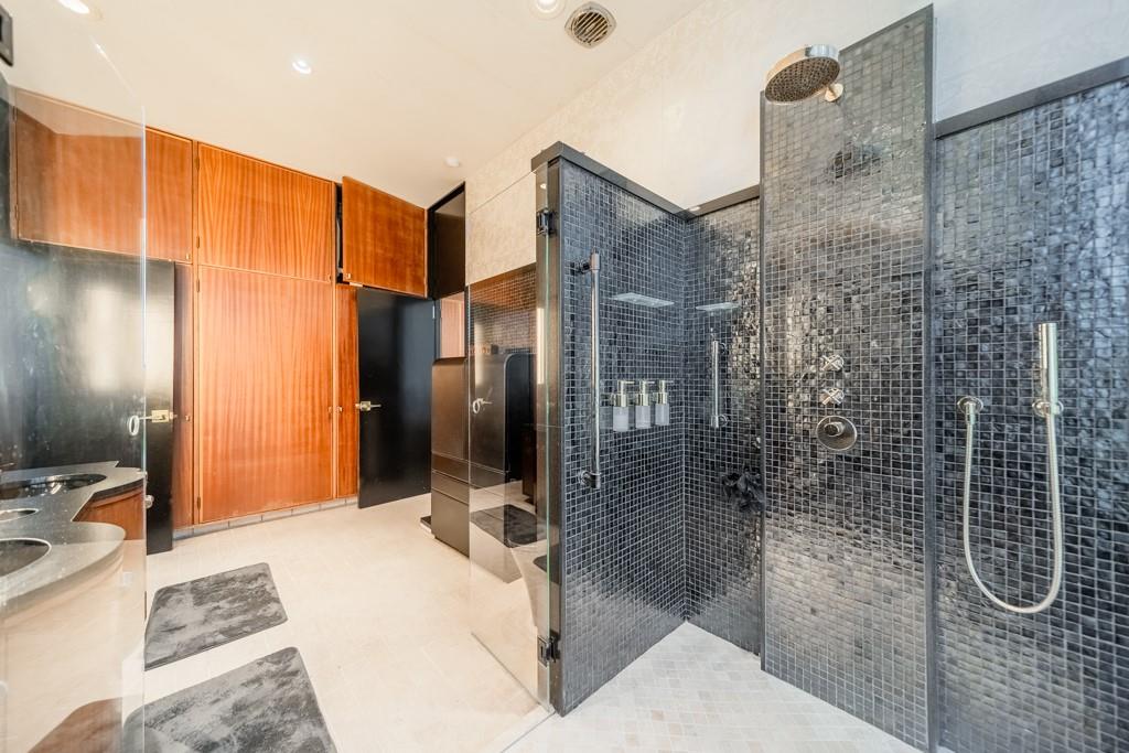 9331 Providence Road Charlotte, NC 28270 - Photo 26 of 39 a bathroom with a bathtub and a shower