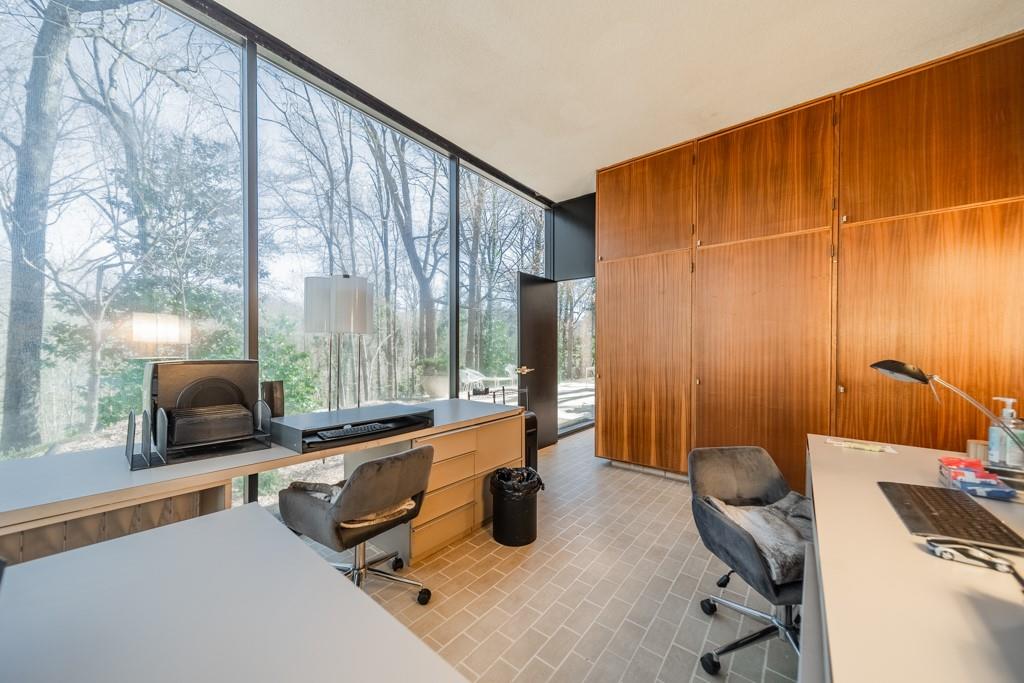 9331 Providence Road Charlotte, NC 28270 - Photo 28 of 39 a dining room with furniture and a floor to ceiling window