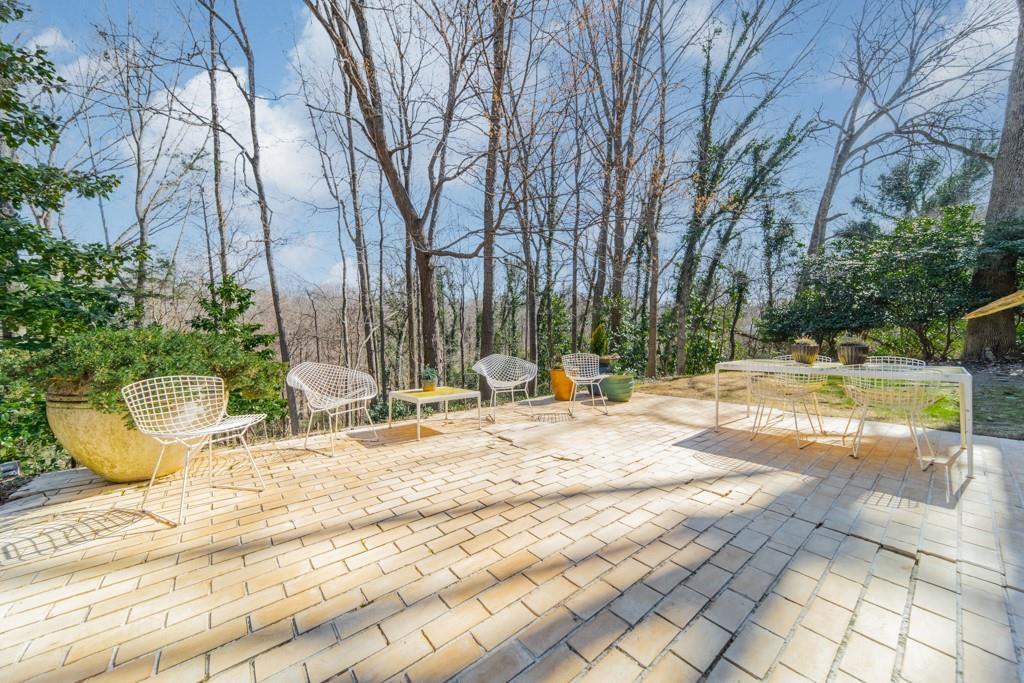 9331 Providence Road Charlotte, NC 28270 - Photo 29 of 39 a view of a swimming pool with lounge chair
