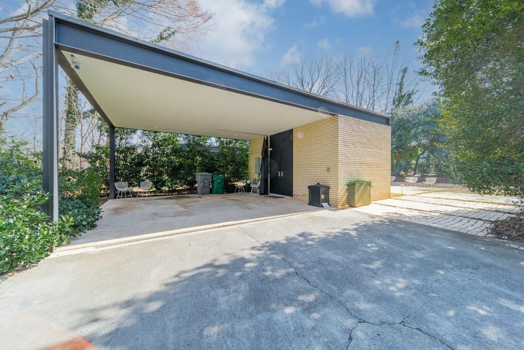 9331 Providence Road Charlotte, NC 28270 - Photo 35 of 39 a view of a house with backyard and a garage