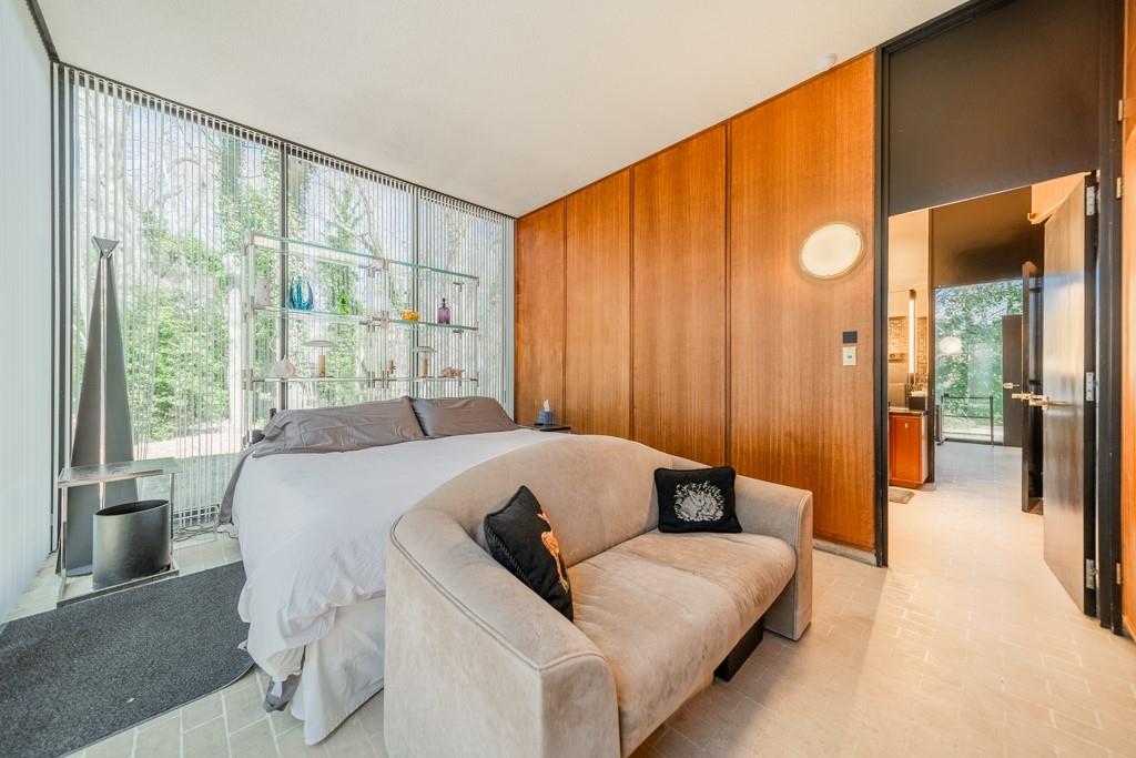 9331 Providence Road Charlotte, NC 28270 - Photo 6 of 39 a bed room with a bed and a couch