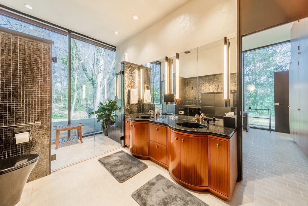 9331 Providence Road Charlotte, NC 28270 - Photo 7 of 39 a kitchen with stainless steel appliances granite countertop sink stove and refrigerator