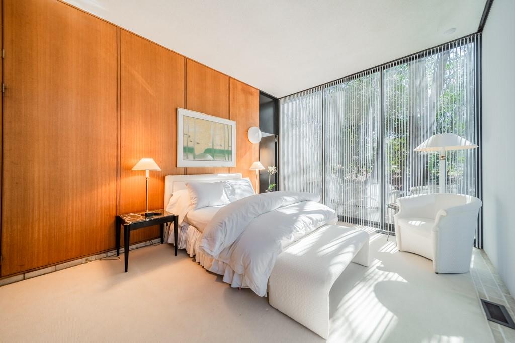 9331 Providence Road Charlotte, NC 28270 - Photo 8 of 39 a bedroom with a bed and a window