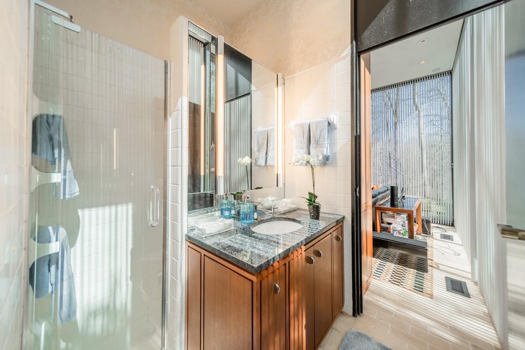 9331 Providence Road Charlotte, NC 28270 - Photo 9 of 39 a bathroom with a granite countertop sink and a mirror