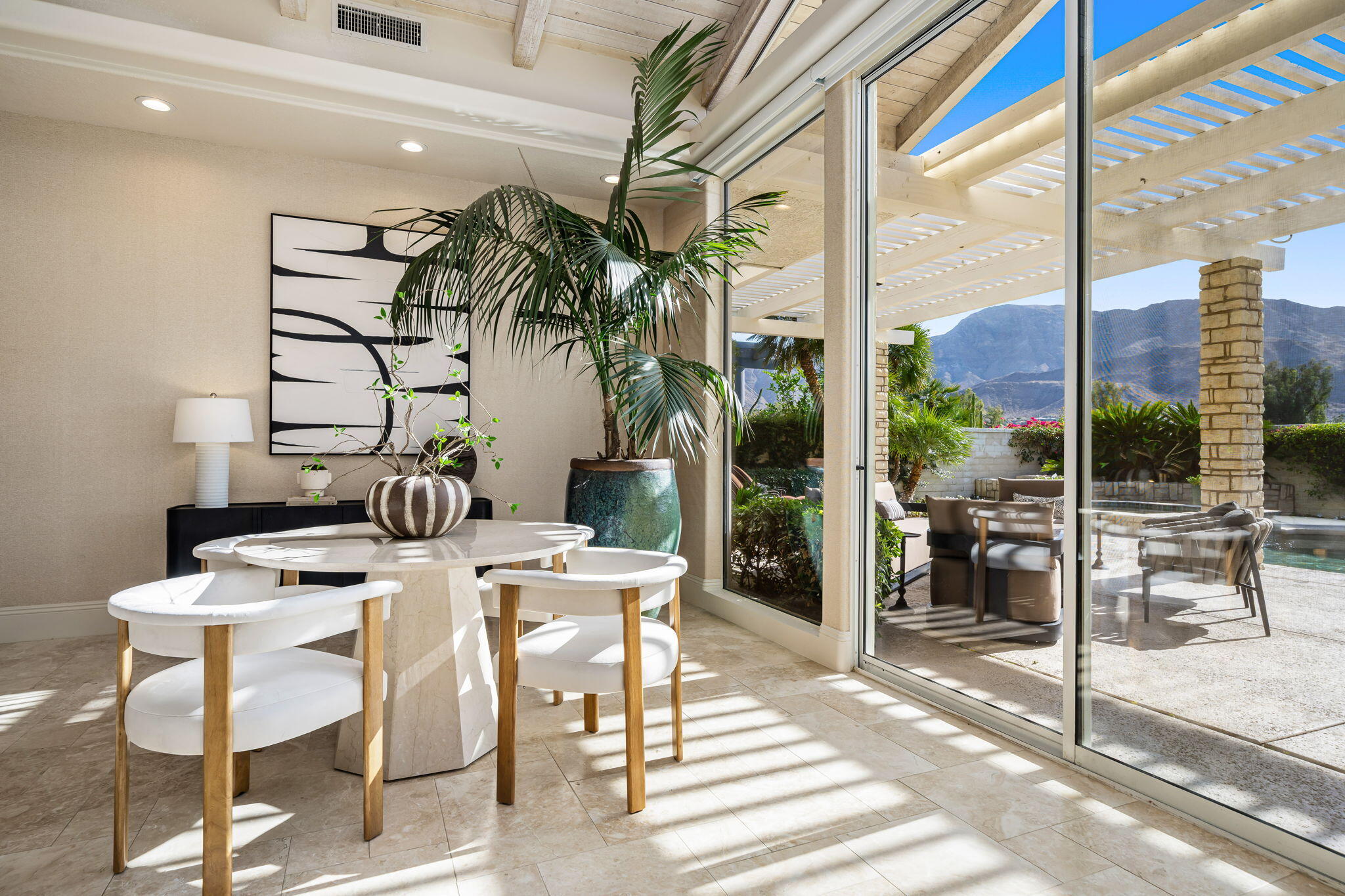 74 Mayfair Drive Rancho Mirage, CA 92270 - Photo 12 of 64 Bright living room with west views