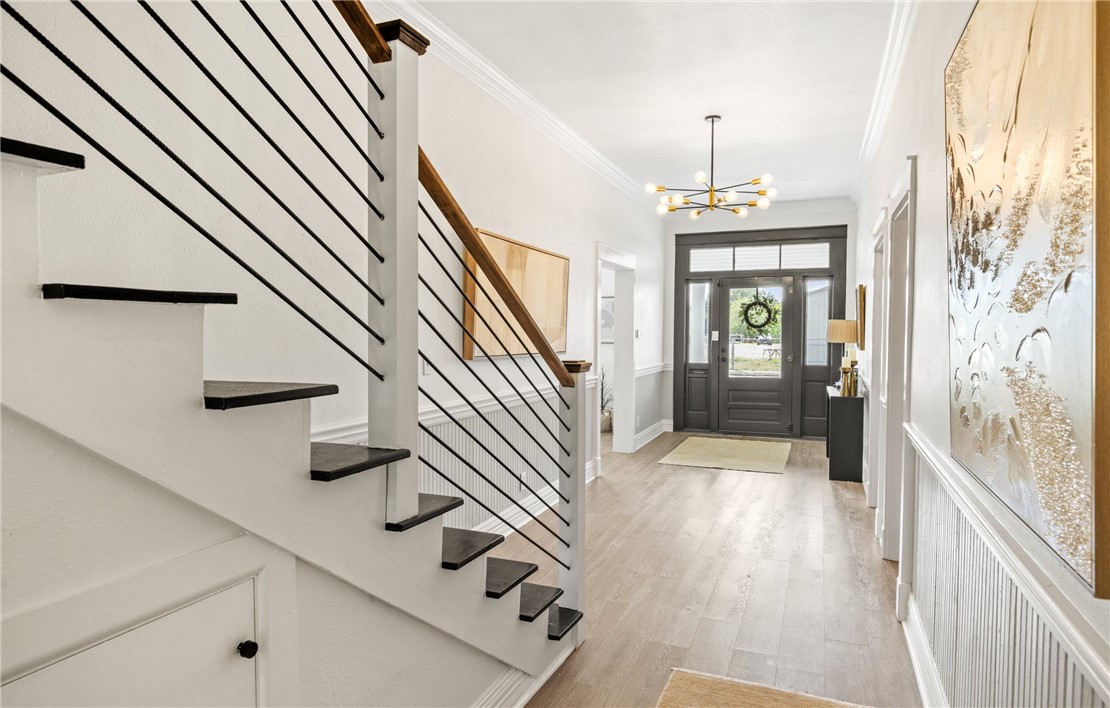 514 West 4th Street Sinton, TX 78387 - Photo 2 of 32 a view of entryway and hall with wooden floor
